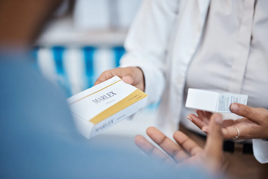 Pharmacy product, customer hands or pharmacist help man with pills choice, pharmaceutical decision or medicine box shopping. Hospital retail shop, medical healthcare support and people in drugs store.